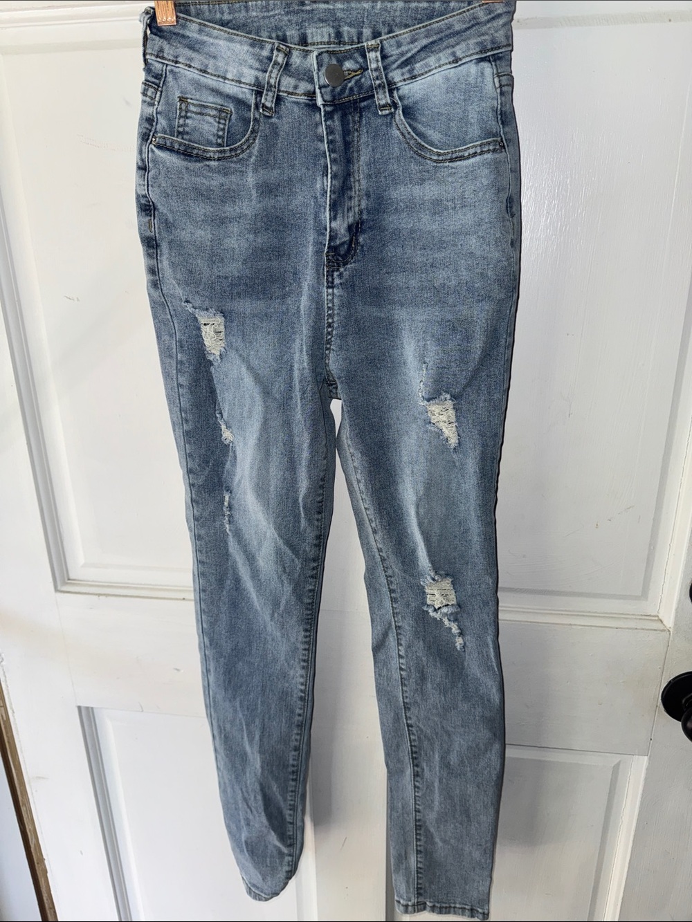 Women's Distressed Light Blue Denim Jeans